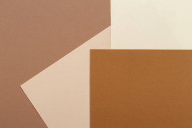 Soyut geometrik kağıt dokusu karton arka plan. Bej rengi, kahverengi sarı pastel renkler