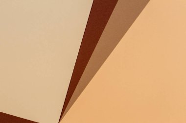 Renk kağıtları geometri kompozisyonu arkaplanı bej ve kahverengi tonlu