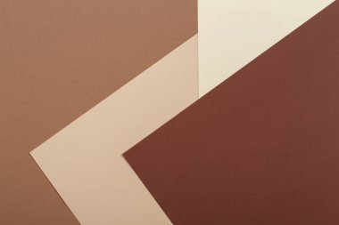 Renk kağıtları geometri kompozisyonu arkaplanı bej ve kahverengi tonlu