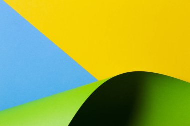 Soyut renkli arkaplan. Geometrik şekillerde sarı kırmızı mavi renkli kağıt