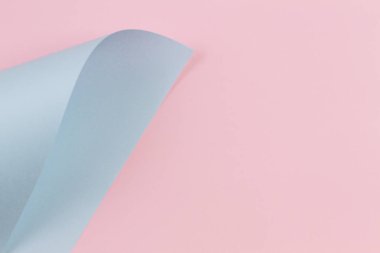 Soyut geometrik şekil pastel pembe ve mavi renkli kağıt arka plan