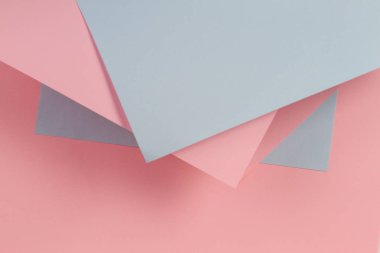 Soyut geometrik şekil pastel pembe ve mavi renkli kağıt arka plan
