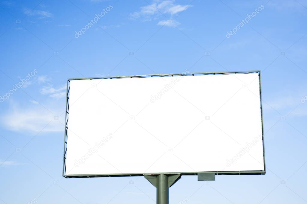 Mock up. Blank white billboard for outdoor advertising, marketing, sales against blue sky