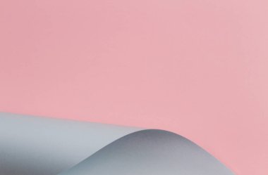 Soyut geometrik şekil pastel pembe ve mavi renkli kağıt arka plan