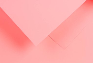Mercan rengi Kağıt arka plan yaşayan soyut geometrik şekil
