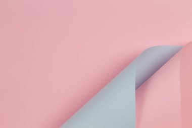 Soyut geometrik şekil pastel pembe ve mavi renkli kağıt arka plan