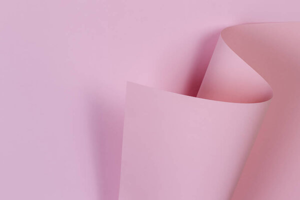 Abstract geometric shape pastel pink color paper background