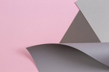 Soyut geometrik şekil gri ve pembe renkli kağıt arkaplan