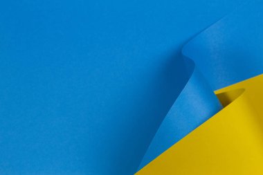 Soyut geometrik şekil pastel mavi ve sarı renkli kağıt arkaplan