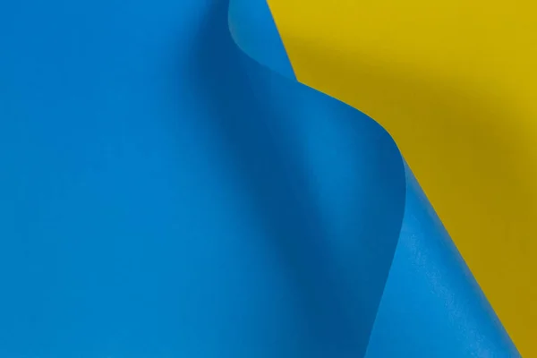 Astratto forma geometrica pastello blu e giallo sfondo di carta colore — Foto Stock