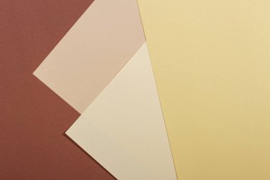 Soyut geometrik kağıt doku arka planı. Bej, kahverengi sarı pastel renkler
