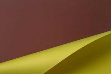 Soyut geometrik şekil sarı kahverengi renk kağıt arka plan.
