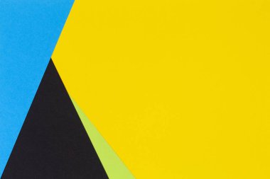 Geometrik düz sarı yeşil mavi ve siyah renk Kağıt arka plan yattı