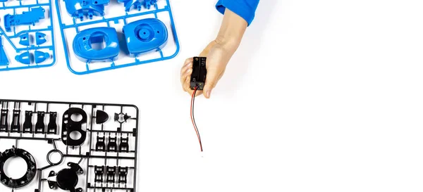 Child hands making robot car. Robotic, learning, technology, stem education for children background — Stock Photo, Image
