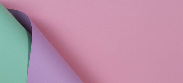 Abstract geometric shape pastel pink purple and green color paper background