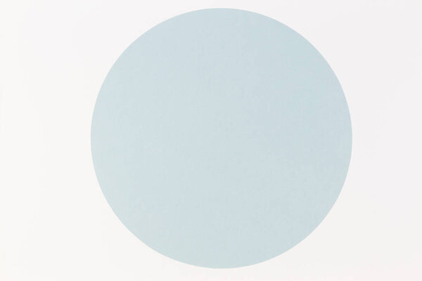 Abstract minimal color paper background. Pastel blue round circle on white background. Top view, flat lay