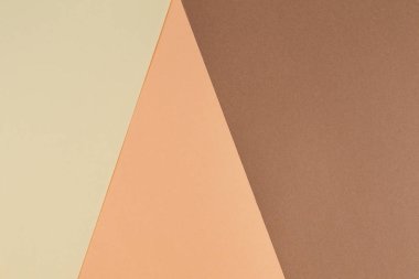 Pembe, bej ve kahverengi tonlar kağıtları geometri kompozisyon arka planını renklendirin.