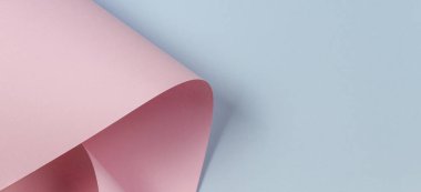 Soyut geometrik şekil pastel pembe ve mavi renkli kağıt arka plan