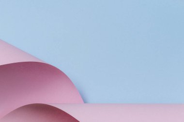 Soyut geometrik şekil pastel pembe ve mavi renkli kağıt arka plan