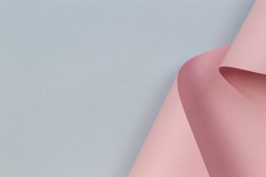 Soyut geometrik şekil pastel pembe ve mavi renkli kağıt arka plan
