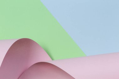 Soyut arka plan. Pastel pembe, yeşil, geometrik şekillerde mavi renkli kağıt