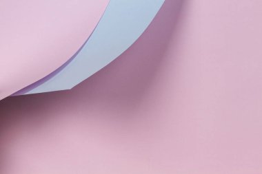Soyut geometrik şekil pastel pembe ve mavi renkli kağıt arka plan