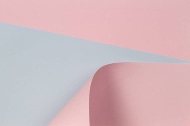 Soyut geometrik şekil pastel pembe ve mavi renkli kağıt arka plan