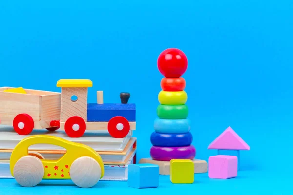 Bebê criança brinquedos coleção no fundo azul — Fotografia de Stock