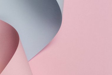 Soyut geometrik şekil pastel pembe ve mavi renkli kağıt arka plan