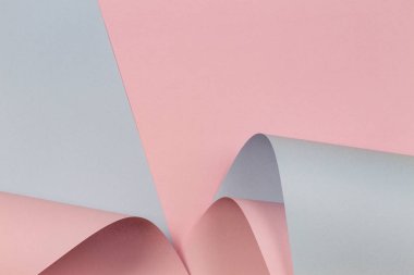 Soyut geometrik şekil pastel pembe ve açık mavi renkli kağıt arka plan