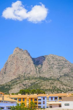 Puig Campana Mountain and small village Finestrat in Costa Blanca, Spain Europe clipart