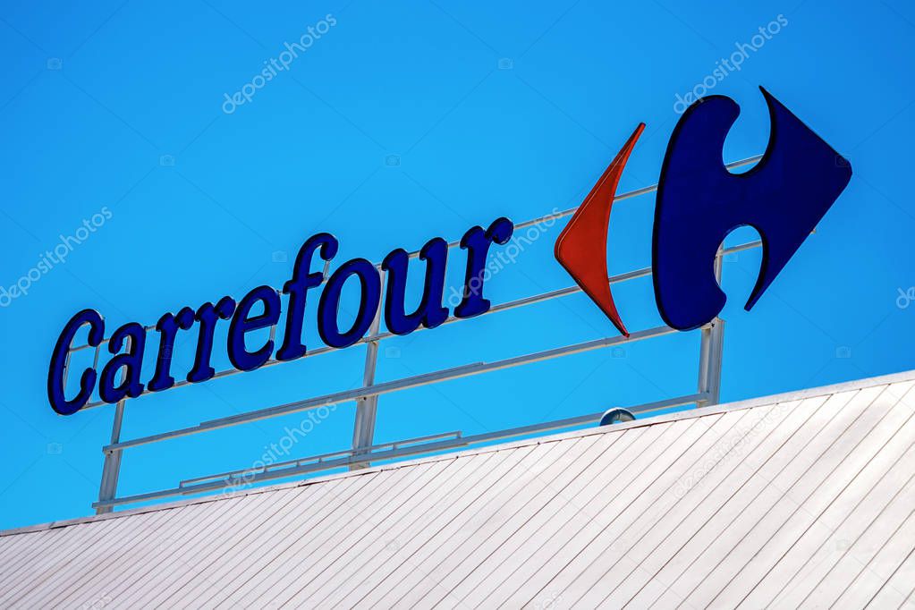 Finestrat, Spain - June 12, 2019: Carrefour logo in Finestrat Spain. Carrefour is one of the largest hypermarket chains in the world