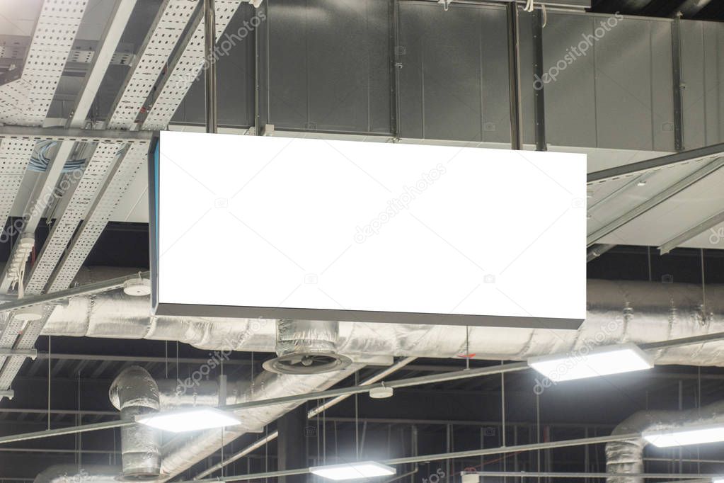 Mock up. Horizontal rectangular white empty signage, information board inside in shopping mall, store