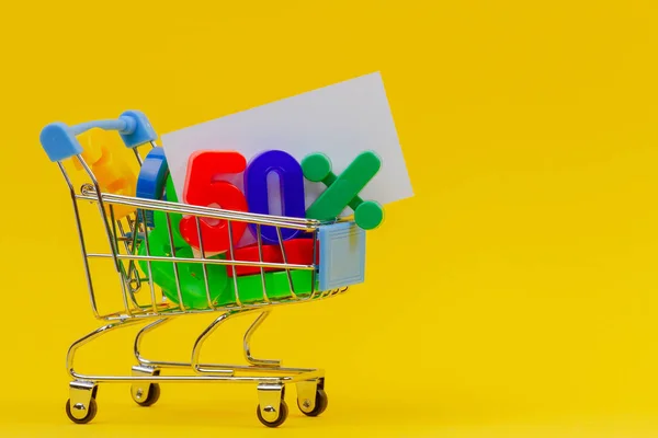 Carrinho de compras ou carrinho de supermercado com sinal de cinquenta por cento e cheio de números coloridos no fundo amarelo — Fotografia de Stock