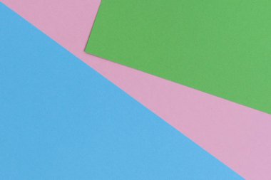 Soyut geometrik şekil açık mavi, yeşil, pastel pembe renkli kağıt arka plan