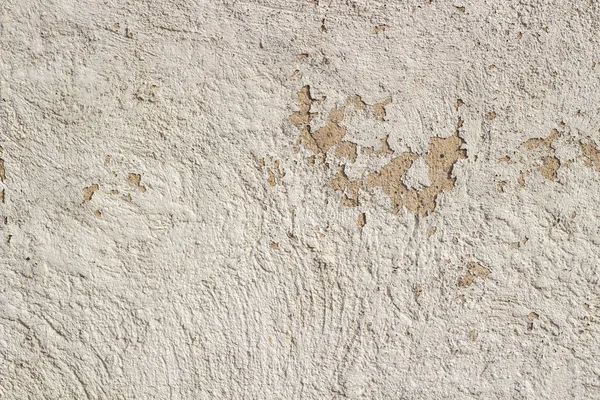 Antiguo agrietado envejecido beige shabby pintado yeso pelado fondo de pared — Foto de Stock