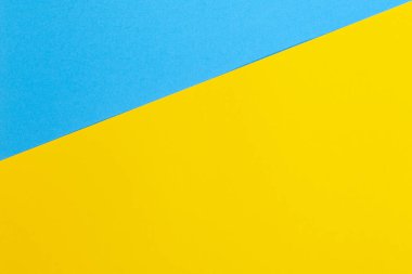 Renkli kağıtlar geometri düz kompozisyon arkaplan sarı ve mavi tonlu
