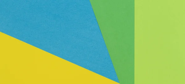 Geometrico piatto laici giallo verde blu colore carta banner sfondo — Foto Stock