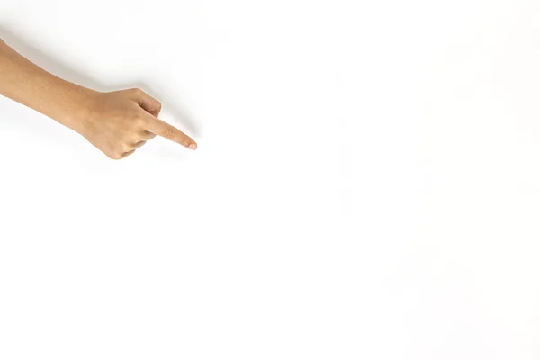 Mano de niño señalando con el dedo a algo sobre fondo blanco — Foto de Stock