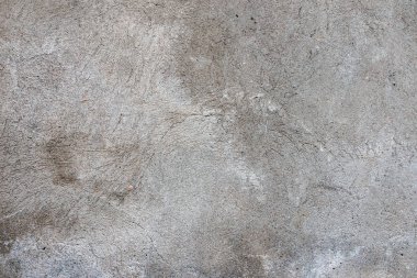 Karanlık alçı duvar kirli kırık çizik arka plan ile. Eski retro vintage brickwall kabuğu gri sıva doku ile