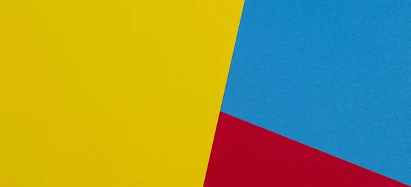 摘要黄、红、浅蓝色彩色纸几何构图背景 — 图库照片