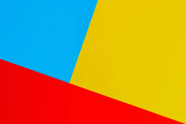 彩色纸几何平面组成背景, 黄色红色和蓝色色调 — 图库照片