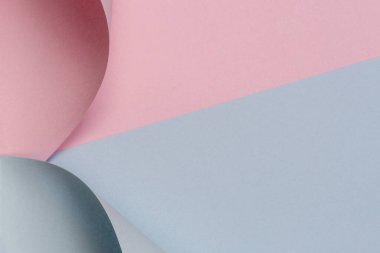 Soyut geometrik şekil pastel pembe ve mavi renkli kağıt arka plan