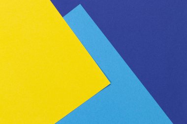 Yaratıcı soyut mavi ve sarı renkli geometrik kağıt kompoziton arkaplan, üst görünüm