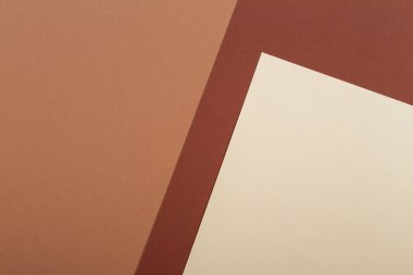 Renk kağıtları geometri kompozisyonu arkaplanı bej ve kahverengi tonlu