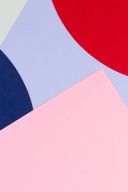 Soyut dikey renkli kağıt doku arkaplanı. Pastel mavisi, açık pembe, yeşil, kırmızı, lacivert renkte en az geometrik şekil ve çizgiler