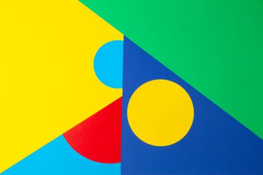 Soyut geometrik şekil sarı, mavi, kırmızı, yeşil renkli kağıt arkaplan