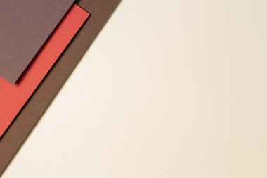 Toprak tonlarında soyut geometrik kağıt arka plan. Bej, mercan, kahverengi arkaplan