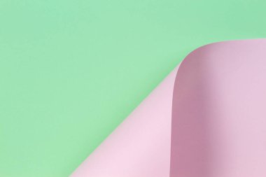 Soyut geometrik şekil pastel yeşil ve pembe renkli kağıt arka plan