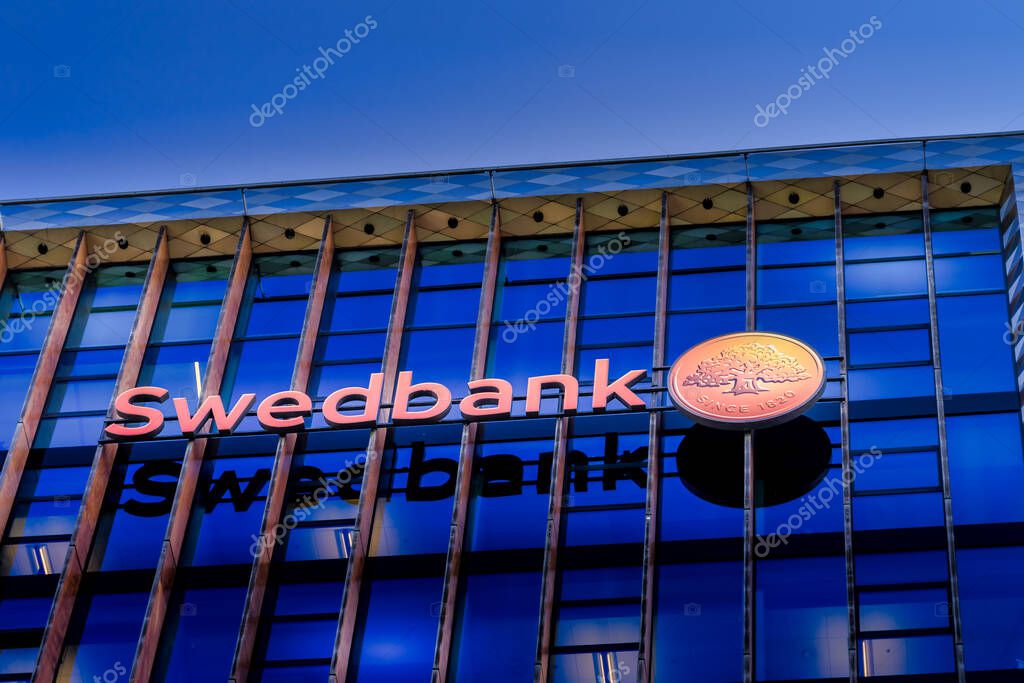 Vilnius, Lithuania- 16 September 2020: Swedbank logo on Swedbank office wall. Swedbank is the leading bank in Sweden Estonia Latvia and Lithuania.